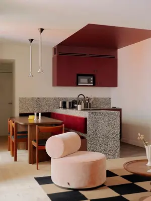 Coin salon dans l'établissement Edgar Suites - Lemercier