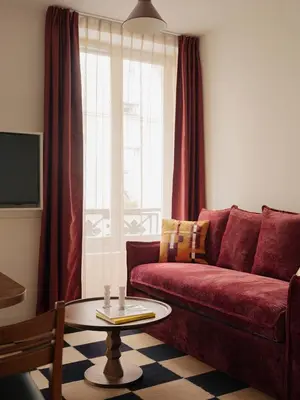 Coin salon dans l'établissement Edgar Suites - Lemercier