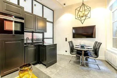 Cuisine ou kitchenette dans l'établissement Magnifique appartement Paris Palais Garnier