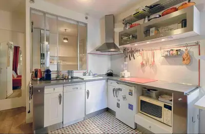 Cuisine ou kitchenette dans l'établissement Lovely studio in the very heart of Montmartre
