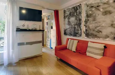 Coin salon dans l'établissement Lovely studio in the very heart of Montmartre