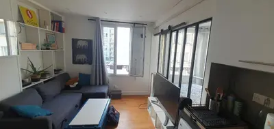 Coin salon dans l'établissement Quiet love nest in Paris