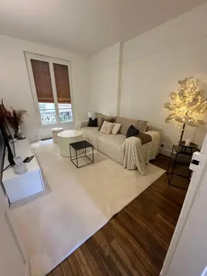 Coin salon dans l'établissement Sublime appartement cosy près de la Tour Eiffel