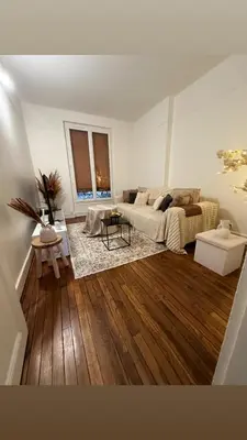 Coin salon dans l'établissement Sublime appartement cosy près de la Tour Eiffel