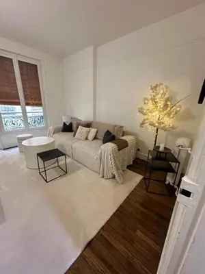 Un ou plusieurs lits dans un hébergement de l'établissement Sublime appartement cosy près de la Tour Eiffel