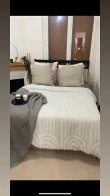 Un ou plusieurs lits dans un hébergement de l'établissement Sublime appartement cosy près de la Tour Eiffel