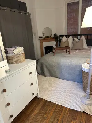 Un ou plusieurs lits dans un hébergement de l'établissement Sublime appartement cosy près de la Tour Eiffel
