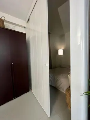 Un ou plusieurs lits dans un hébergement de l'établissement Charming Loft - Louvre Rivoli