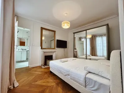 Un ou plusieurs lits dans un hébergement de l'établissement Beautiful Flat by Louvre & Tuileries