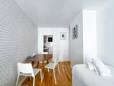 Coin salon dans l'établissement Appartement 02 - Paris Faubourg Bail Mobilité