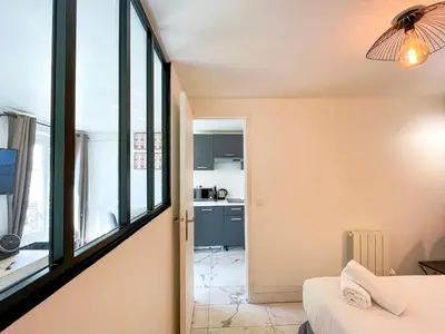 Un ou plusieurs lits dans un hébergement de l'établissement Appartement 03 - Paris Faubourg Bail Mobilité