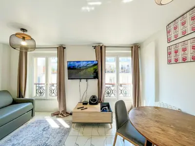 Coin salon dans l'établissement Appartement 03 - Paris Faubourg Bail Mobilité