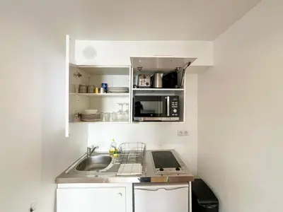 Cuisine ou kitchenette dans l'établissement Studio 08 - Paris Faubourg Bail Mobilité