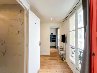 Télévision ou salle de divertissement dans l'établissement Studio 08 - Paris Faubourg Bail Mobilité