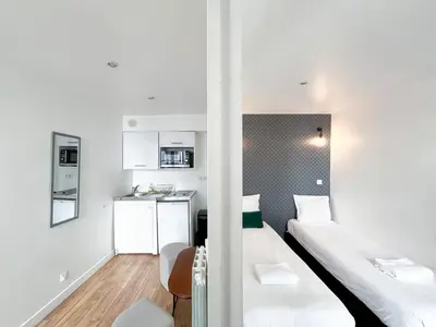 Cuisine ou kitchenette dans l'établissement Studio 08 - Paris Faubourg Bail Mobilité