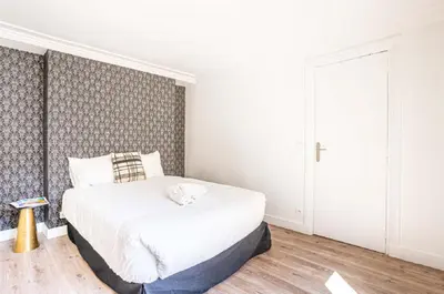 Un ou plusieurs lits dans un hébergement de l'établissement Appartement 09 - Paris Faubourg Bail Mobilité