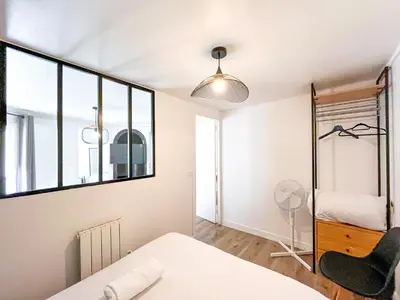 Un ou plusieurs lits dans un hébergement de l'établissement Appartement 09 - Paris Faubourg Bail Mobilité