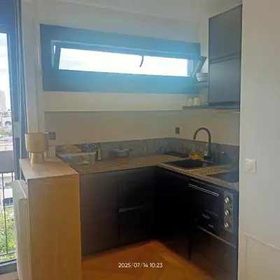 Cuisine ou kitchenette dans l'établissement Location Studio