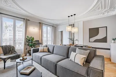 Coin salon dans l'établissement Han - 3 chambres et balcon à Trocadéro