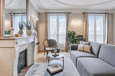 Coin salon dans l'établissement Han - 3 chambres et balcon à Trocadéro