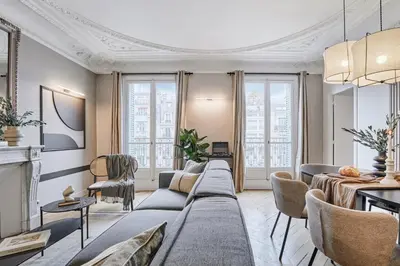 Coin salon dans l'établissement Han - 3 chambres et balcon à Trocadéro