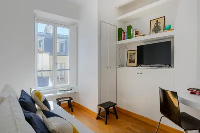 Télévision ou salle de divertissement dans l'établissement Paris St Germain Central residence