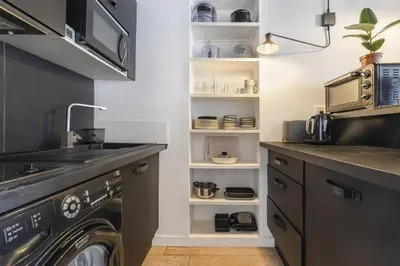 Cuisine ou kitchenette dans l'établissement Notre-Dame
