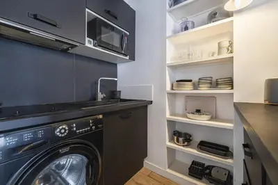 Cuisine ou kitchenette dans l'établissement Notre-Dame