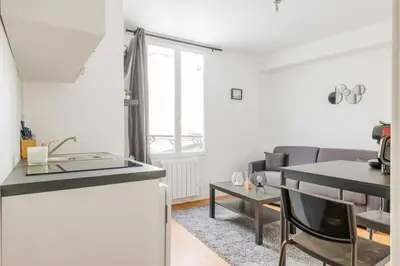 Cuisine ou kitchenette dans l'établissement Cozy Studio Place de la Bastille 2P