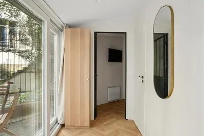 Télévision ou salle de divertissement dans l'établissement Lavie Maison Terrace and AC