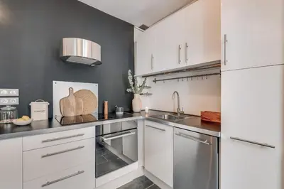 Cuisine ou kitchenette dans l'établissement Vaux - 1 chambre a Batignolles