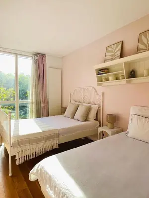 Un ou plusieurs lits dans un hébergement de l'établissement Seine View 120m2-2bedrooms