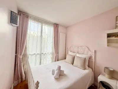 Un ou plusieurs lits dans un hébergement de l'établissement Seine View 120m2-2bedrooms