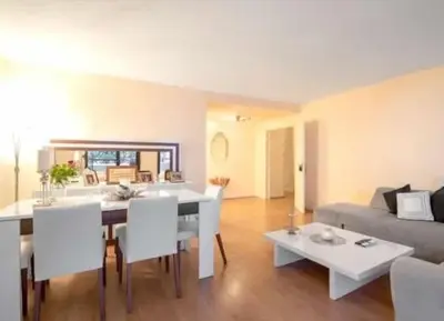 Coin salon dans l'établissement Jolie appartement