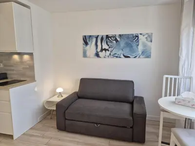 Coin salon dans l'établissement Studio à Bagneux avec terrasse privée, parking et climatisation payants