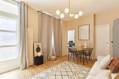 Coin salon dans l'établissement Charming Studio Auteuil District