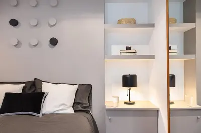 Un ou plusieurs lits dans un hébergement de l'établissement Jonquille - Duplex 2 chambres à Jardin des Plantes