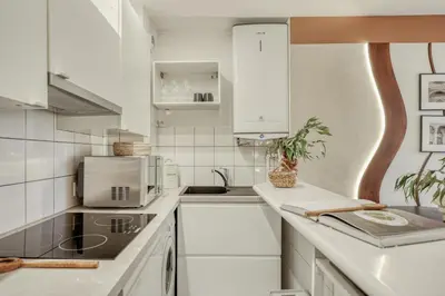 Cuisine ou kitchenette dans l'établissement Bosporus - 1 chambre à Saint-Ambroise