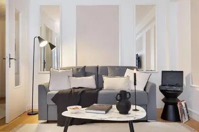 Coin salon dans l'établissement Castel - 1 chambre à Auteuil