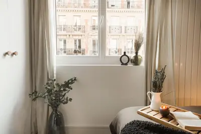 Un ou plusieurs lits dans un hébergement de l'établissement Freila - 2 chambres à Batignolles