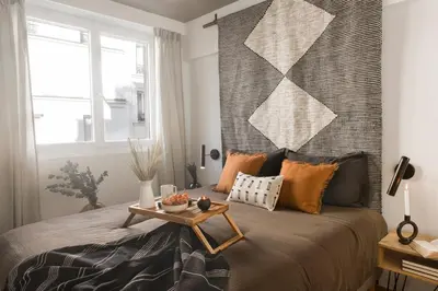 Coin salon dans l'établissement Freila - 2 chambres à Batignolles