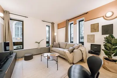 Coin salon dans l'établissement Emir - 1 chambre à Vaugirard