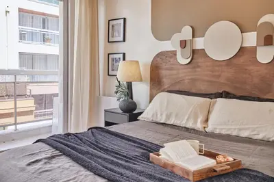 Un ou plusieurs lits dans un hébergement de l'établissement Sanoa - 3 chambres et balcon à Muette / Passy