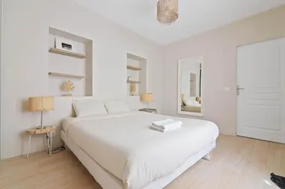 Un ou plusieurs lits dans un hébergement de l'établissement 1 Bedroom Apartment - 6P - Le Marais With NetFlix