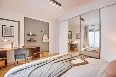 Un ou plusieurs lits dans un hébergement de l'établissement Gueta - 3 chambres à Jardin des Plantes