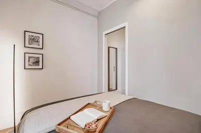 Un ou plusieurs lits dans un hébergement de l'établissement Davia - 2 chambres à Salpêtrière