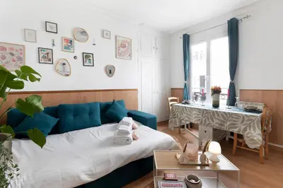 Coin salon dans l'établissement Bright & Charming Apartment in Paris 1BDR