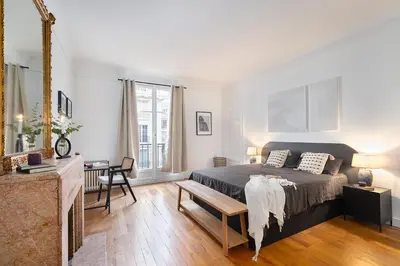 Un ou plusieurs lits dans un hébergement de l'établissement Giverny - 2 chambres à Neuilly-sur-Seine