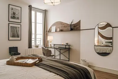 Un ou plusieurs lits dans un hébergement de l'établissement Tenam - 1 chambre à Archives (3 Arr.)