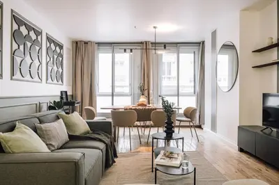 Coin salon dans l'établissement Moda - 3 chambres à Trocadéro